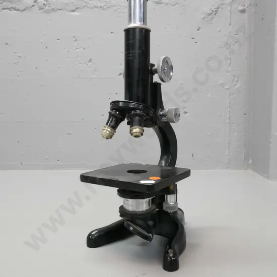 vintage microscope, cast metal case. Watsons & Sons, London. Some scratching to paintwork. H-350 W-200