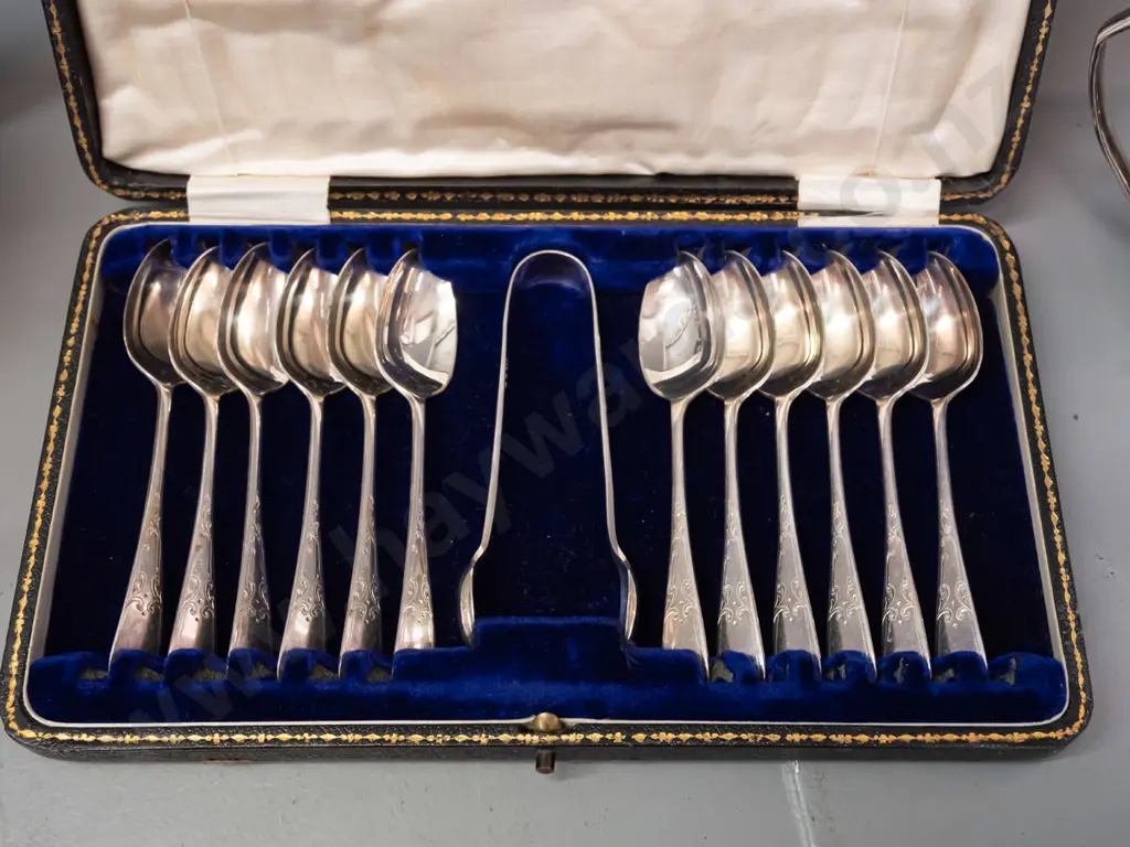 cased set of 12 teaspoons plus sugar-tongs, plated. Art Deco-style plated teapot, sugar and cream jug w/ bakelite handle Image 1++