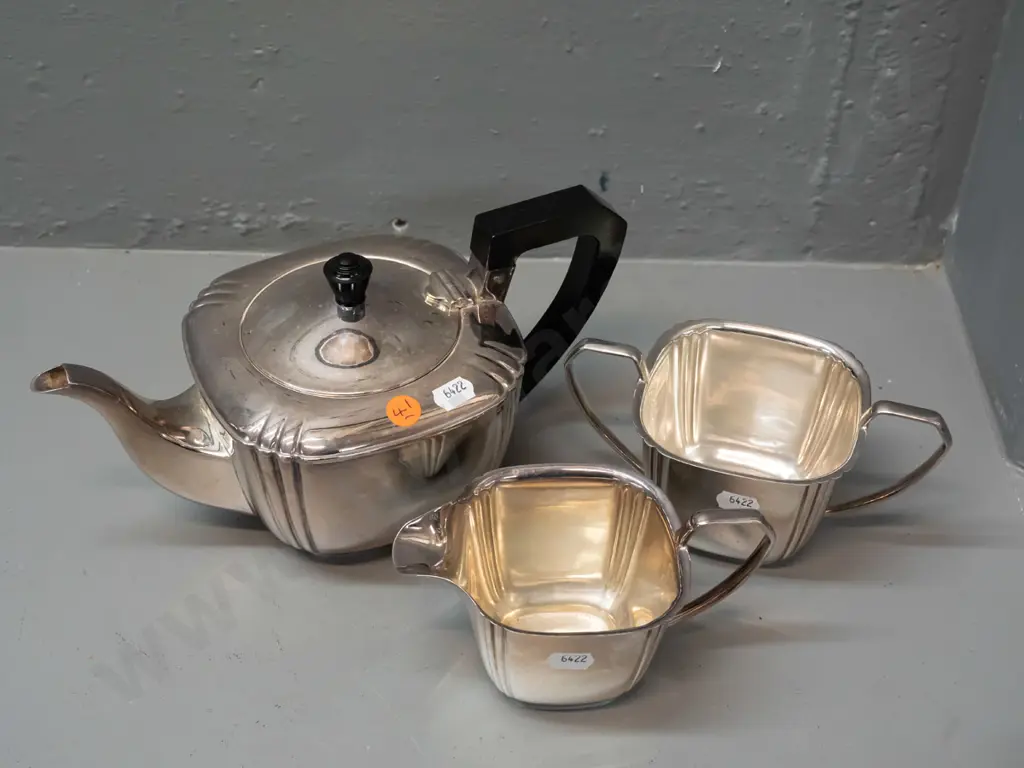 cased set of 12 teaspoons plus sugar-tongs, plated. Art Deco-style plated teapot, sugar and cream jug w/ bakelite handle Image 1++