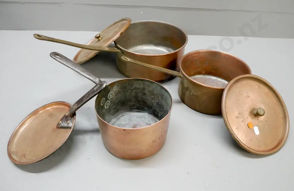 3x vintage saucepans, coppered white metal. Two with brass handles, one with cast handles. Image 1++