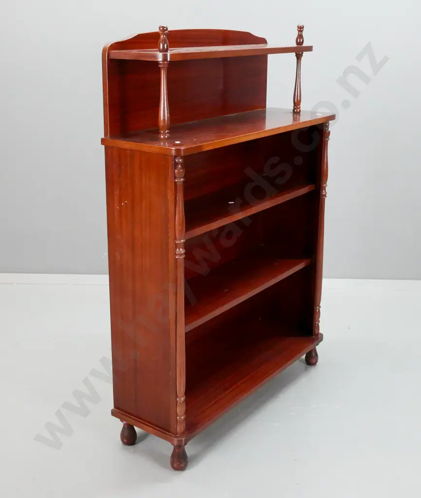 reproduction Victorian style mahogany open-shelf bookcase with turned supports and finials, RA Davies Christchurch label Image 1++
