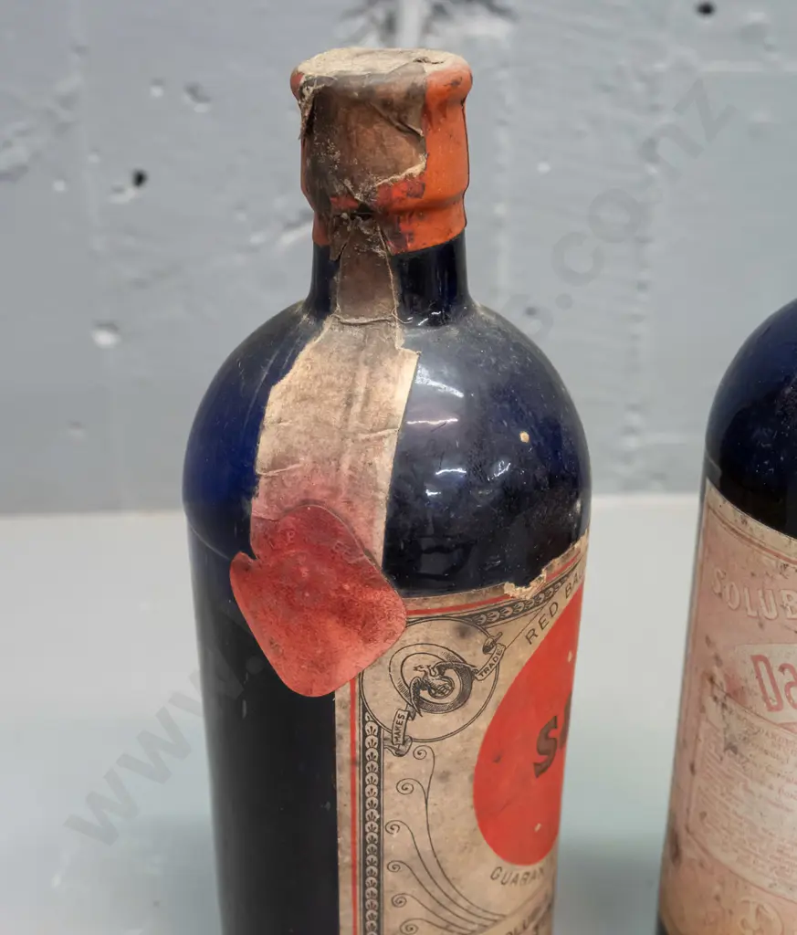 2 vintage cobalt blue bottles with labels and contents - Duckworth & Co Dandelion & Burdock stout & Stevenson & Howell Image 1++
