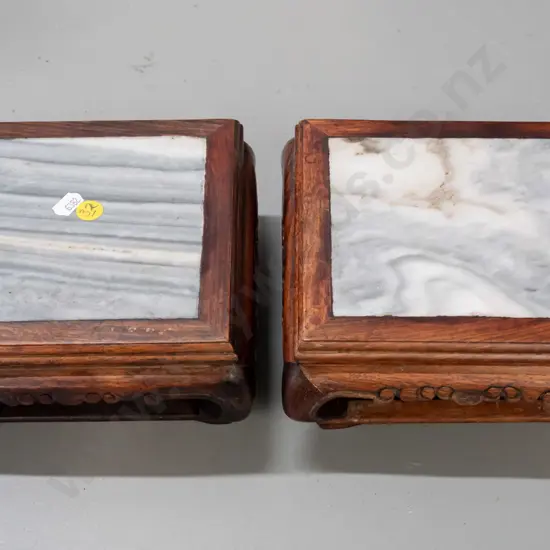 pair of Chinese hardwood and veined marble stands with scrolling feet, one stretcher corner join loose