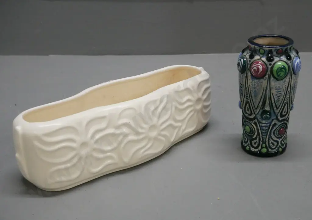 Crown Lynn trough with moulded floral decoration. Heavily crazed, chip to bottom rim, cracks to top rim.. Image 1++
