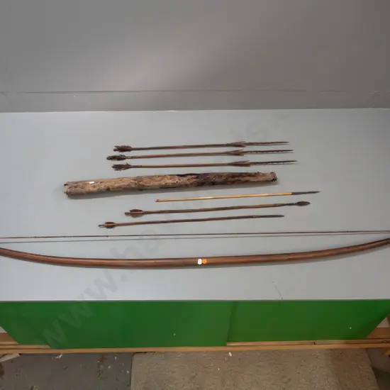 wooden bow and 6 arrows in hide quiver, possibly South Sudan according to note - 3 arrows have steel heads. Quiver is