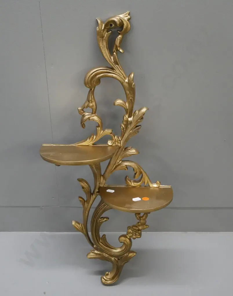 Rococo-style hanging double shelf in gold-painted cast alloy. By Duncraft, Timaru. L-650 Image 1++