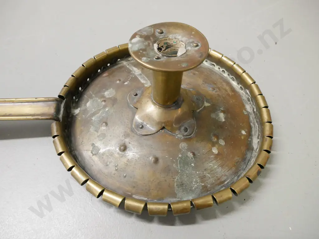 vintage brass folk art chamber stick. Some wax residue. Some dinting to candle-holder. H-100 L-400 Image 1++
