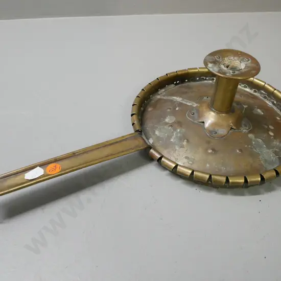 vintage brass folk art chamber stick. Some wax residue. Some dinting to candle-holder. H-100 L-400