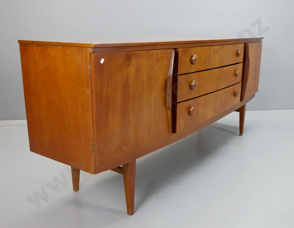 Scandinavian style teak bow-front sideboard with 2 cupboard doors, 3 drawers, wooden knobs, top drawer with lined Image 1++