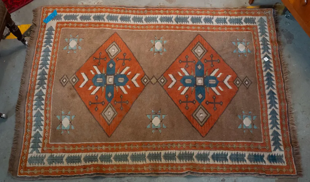 hand knotted wool floor rug in blue, orange, cream and brown geometric patterns - wear to fringe, staining L-1640 Image 1++