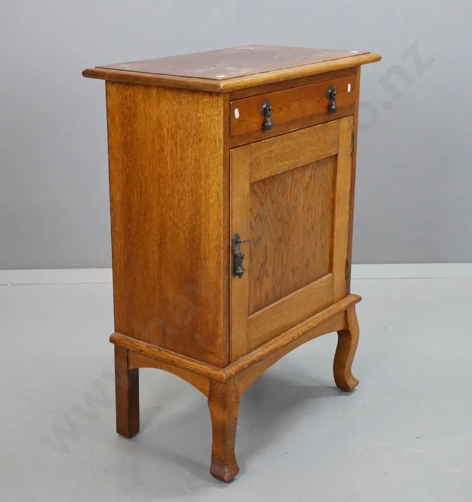 vintage oak cab leg bedside cupboard with 1 drawer, 1 door, one interior shelf, metal drop handles. Marks on top, borer Image 1++