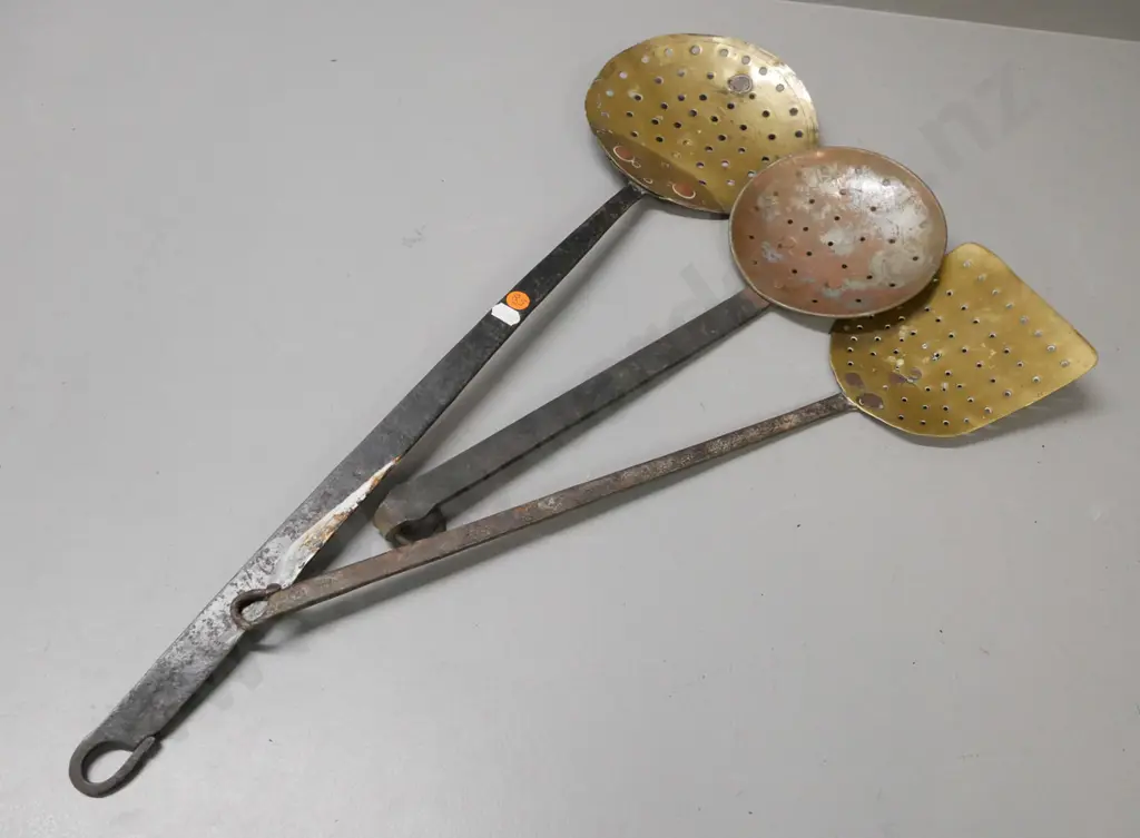 3x vintage straining utensils. Wrought iron handles, 2x brass dishes and 1x coppered white metal. Some corrosion & wear Image 1++