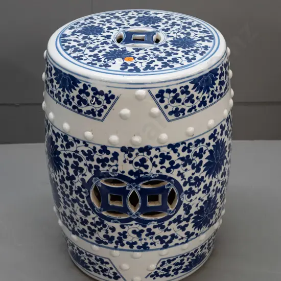 Chinese blue and white ceramic garden seat with pierced cutouts in top and sides, raised stud pattern H-420 D-290 at top