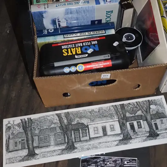 box; cookbooks, unframed prints, bait station