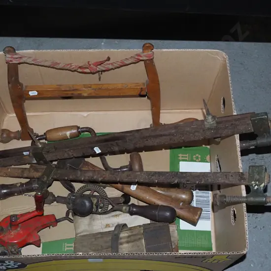 box of vintage tools, sash clamps, sharpening stone etc