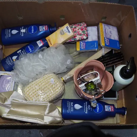 box; shampoos, toilet seat covers, brushes etc