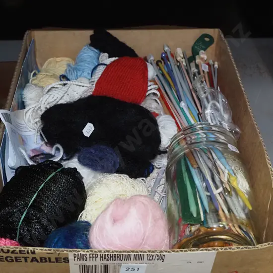 box; sewing needles, knitting yarn etc