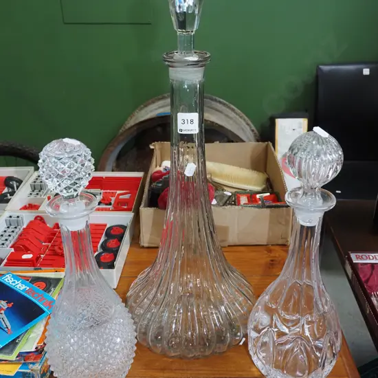 3x stoppered decanters Tallest H-500
