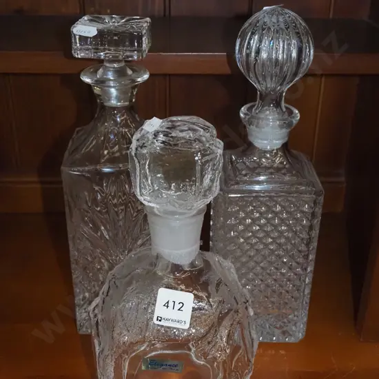 3x stopppered glass decanters