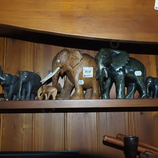 various elephant figurines - some missing tusks