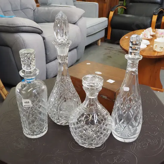 4x stoppered decanters - 1 has small chip to rim Tallest H-380