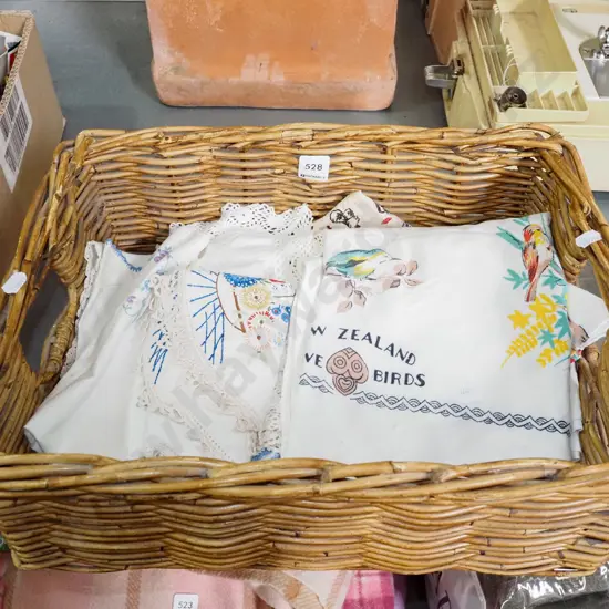 cane basket, NZ themed tablecloth, linen etc