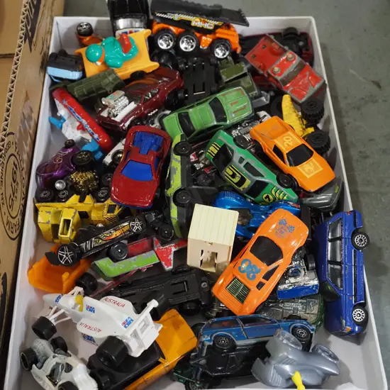 tray of model vehicles
