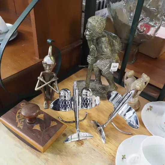 carved stone figurines, deco plane salt and pepper holders etc