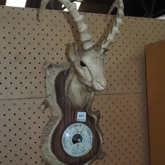 plastic goat themed barometer