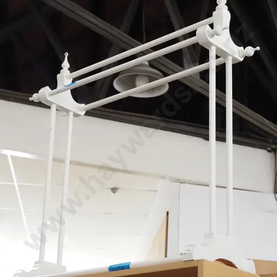 white wooden towel rail