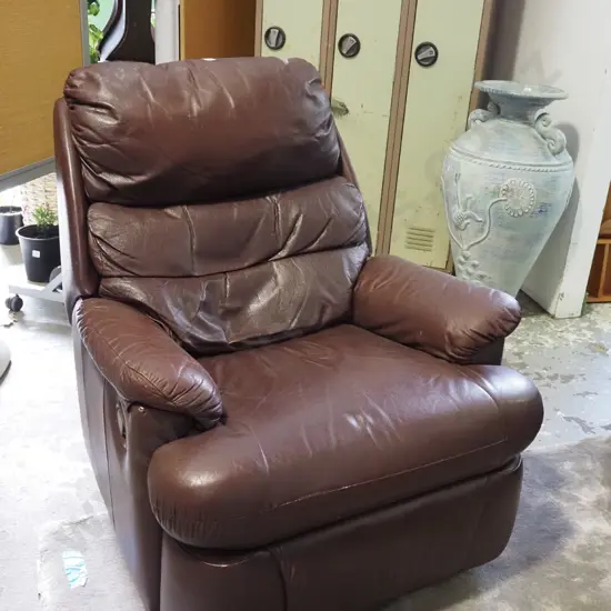 brown leather reclining armchair