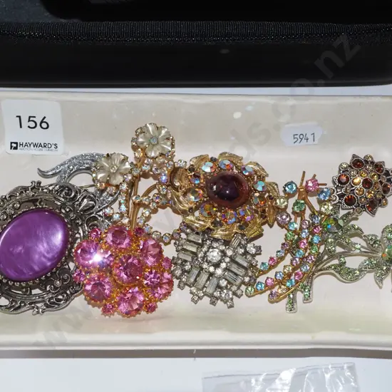 tray of costume brooches