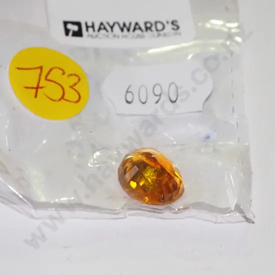 oval cut orange sapphire 11.73 x 9.45 x5.84 6.10cts