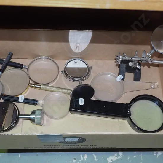 box; various magnifying glasses, fly tieing stand
