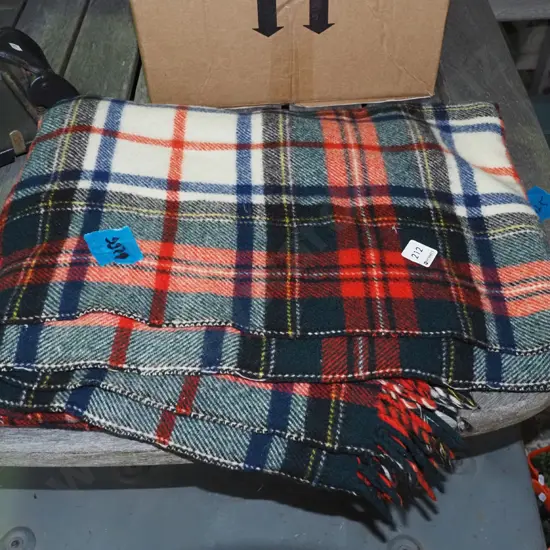 checked woollen travel rug