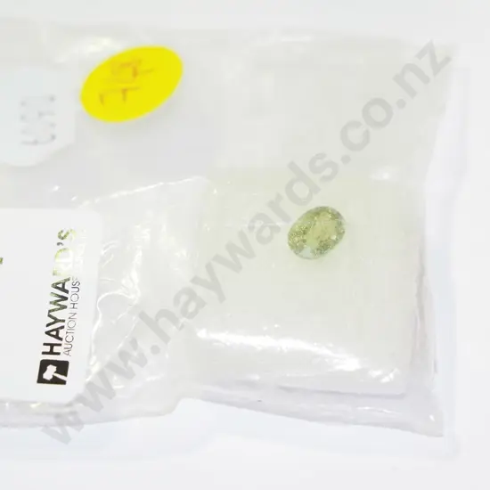 5.6 x 7.66 oval light green tourmaline stone