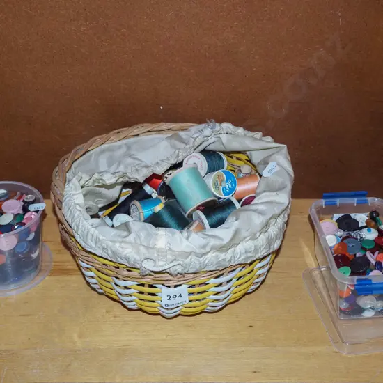 shelf; cane baskets, buttons, sewing threads