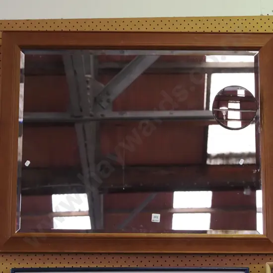 wood framed wall mirror with 1 other mirror glued on 