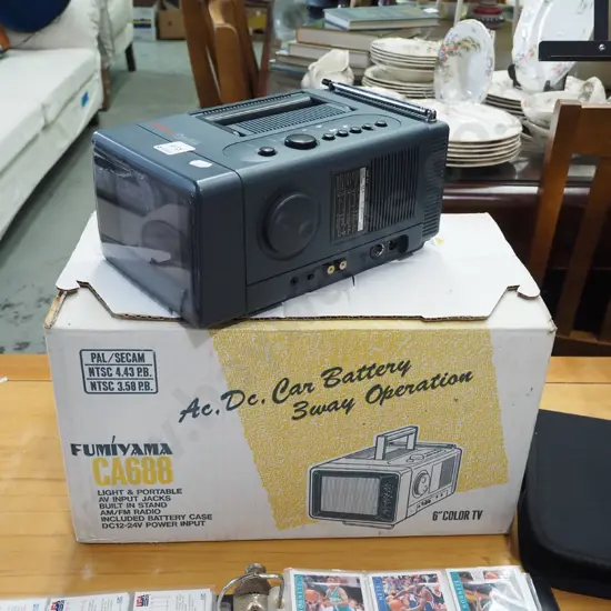 as new boxed Fumiyama 6" TV with radio