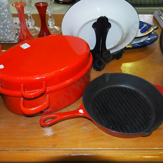 red enamel lidded casserole, frying pan