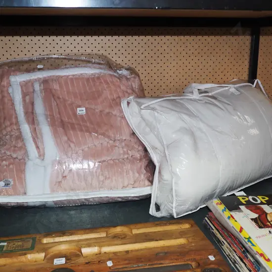 pink bedspread, cushion