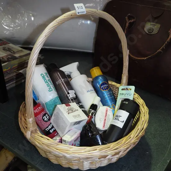 cane basket; hair spray, sunscreen, tissues etc