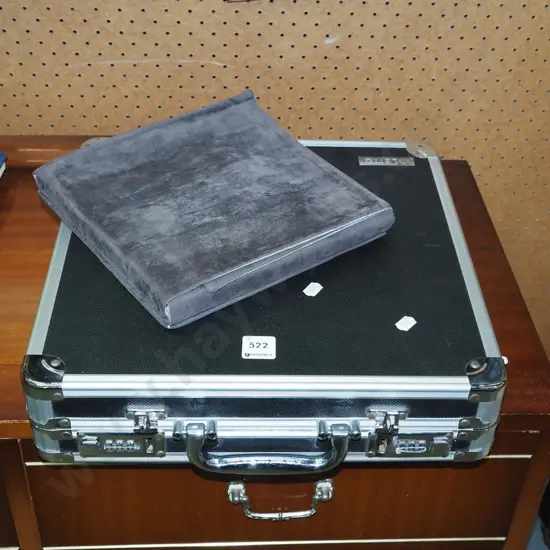 equipment case with internal binder, earring storage