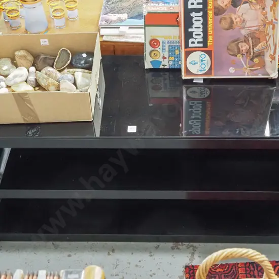 black glass and metal entertainment unit H-480 W-1110 D-