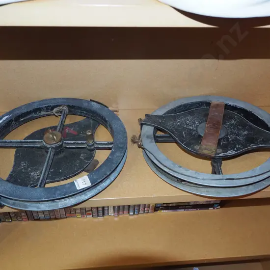 pair of open reel vintage measuring tapes