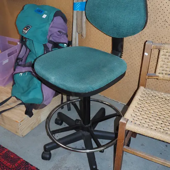 green upholstered office chair