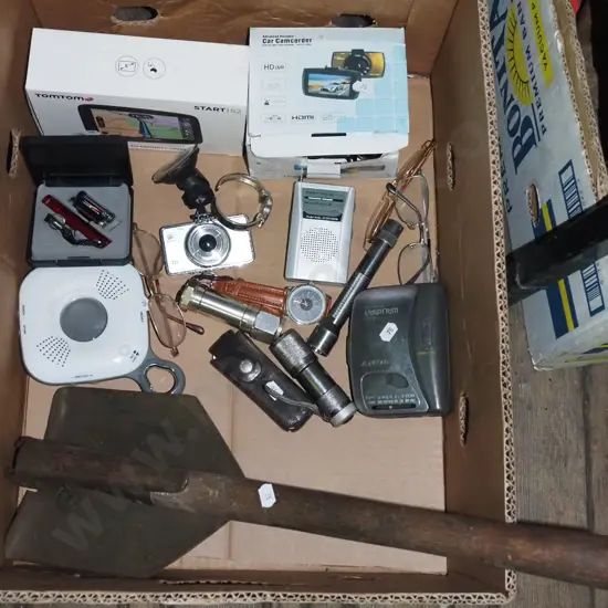 box; trenching shovel, car cam-corder, transistor radio etc