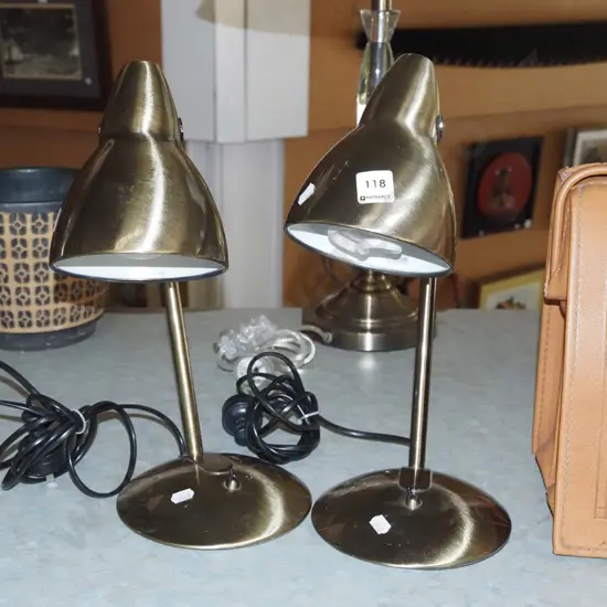 pair of brushed metal bedside lamps