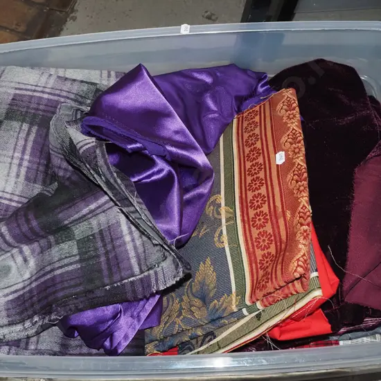 plastic lidded tub; fabric pieces