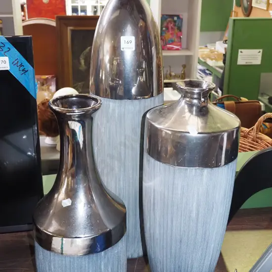 3x ceramic and chrome vases Tallest H+600